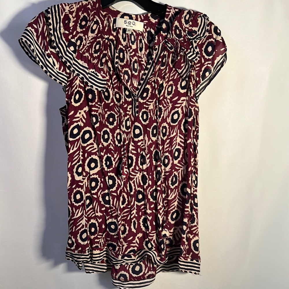 Sea by New York top.